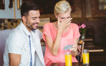 How to Tell if a Guy Likes You at Work: 15 Signs He’s Hitting on You